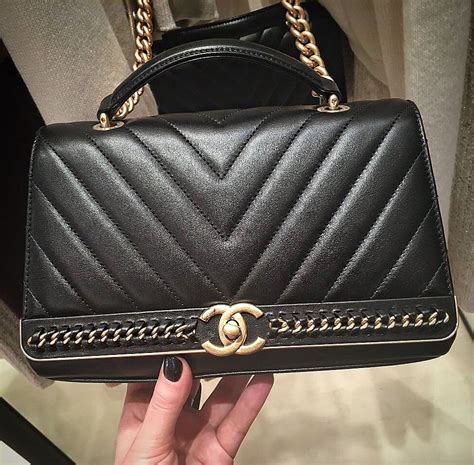 chanel flap bag with top handle chevron|Chanel flap bag medium size.